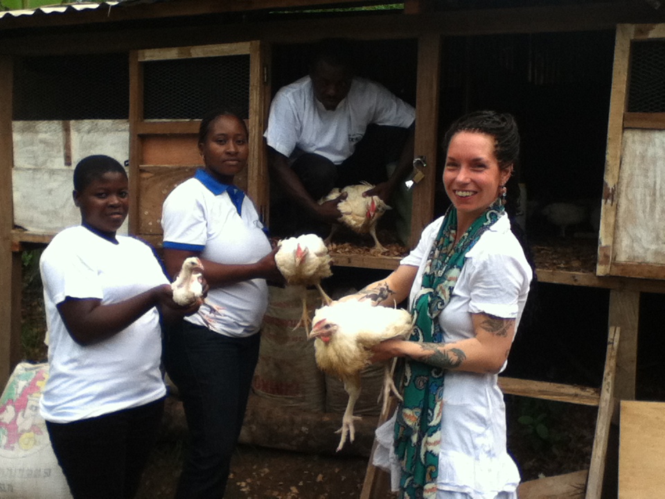 Volunteers in a poultry farm